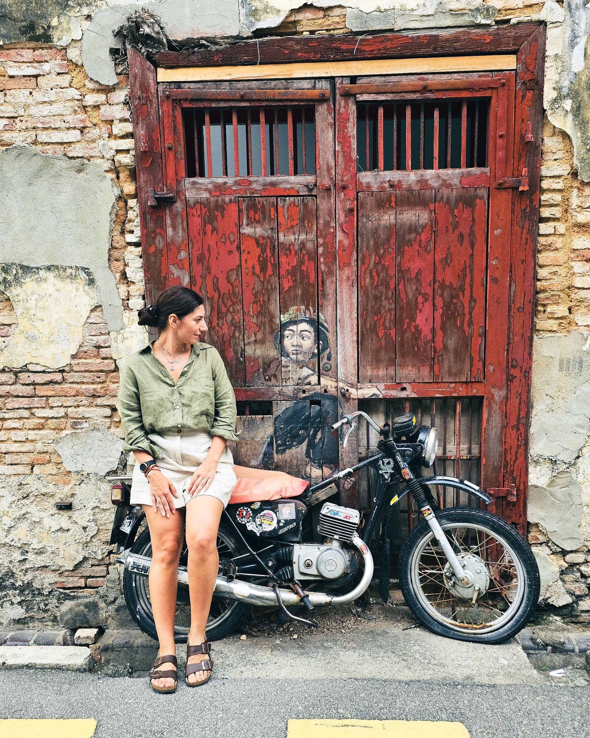 One of Ernest Zacharevic's 3D-style murals on a George Town shophouse wall